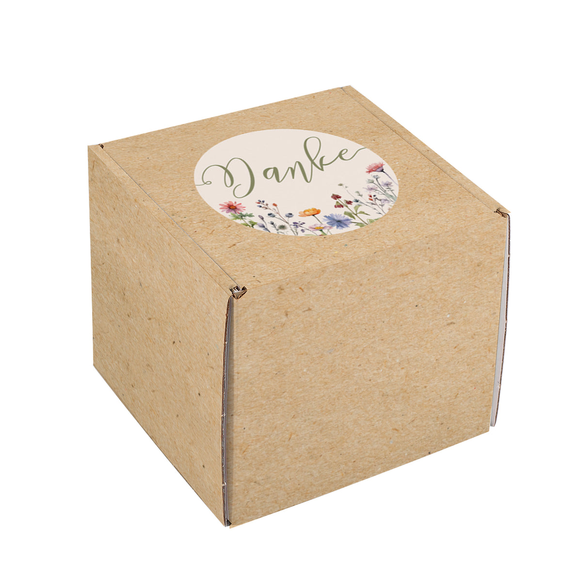 Freigestellte Geschenkverpackung mit floraler Optik und Aufdruck Danke – vollständig bedruckt, keine Aufkleber