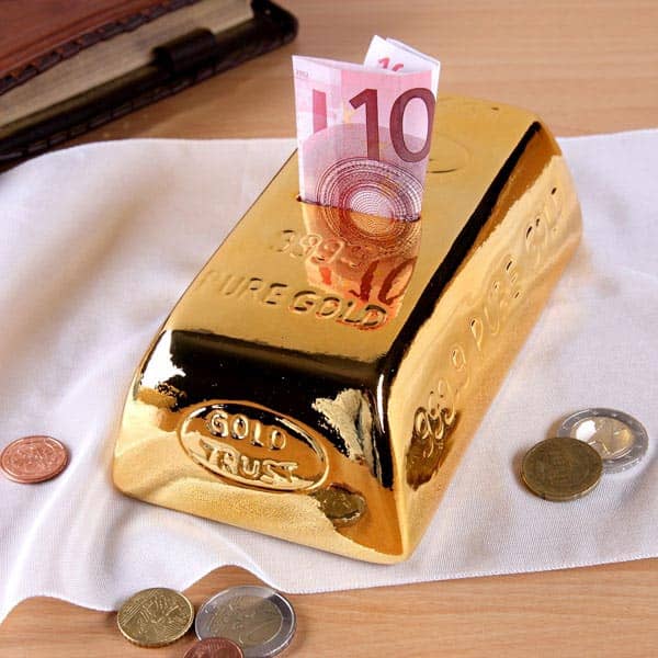 goldene Spardose in Form eines Goldbarren