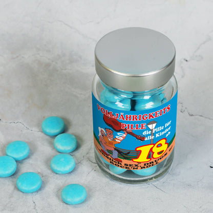 Pillenglas mit blauen Traubenzucker Pillen