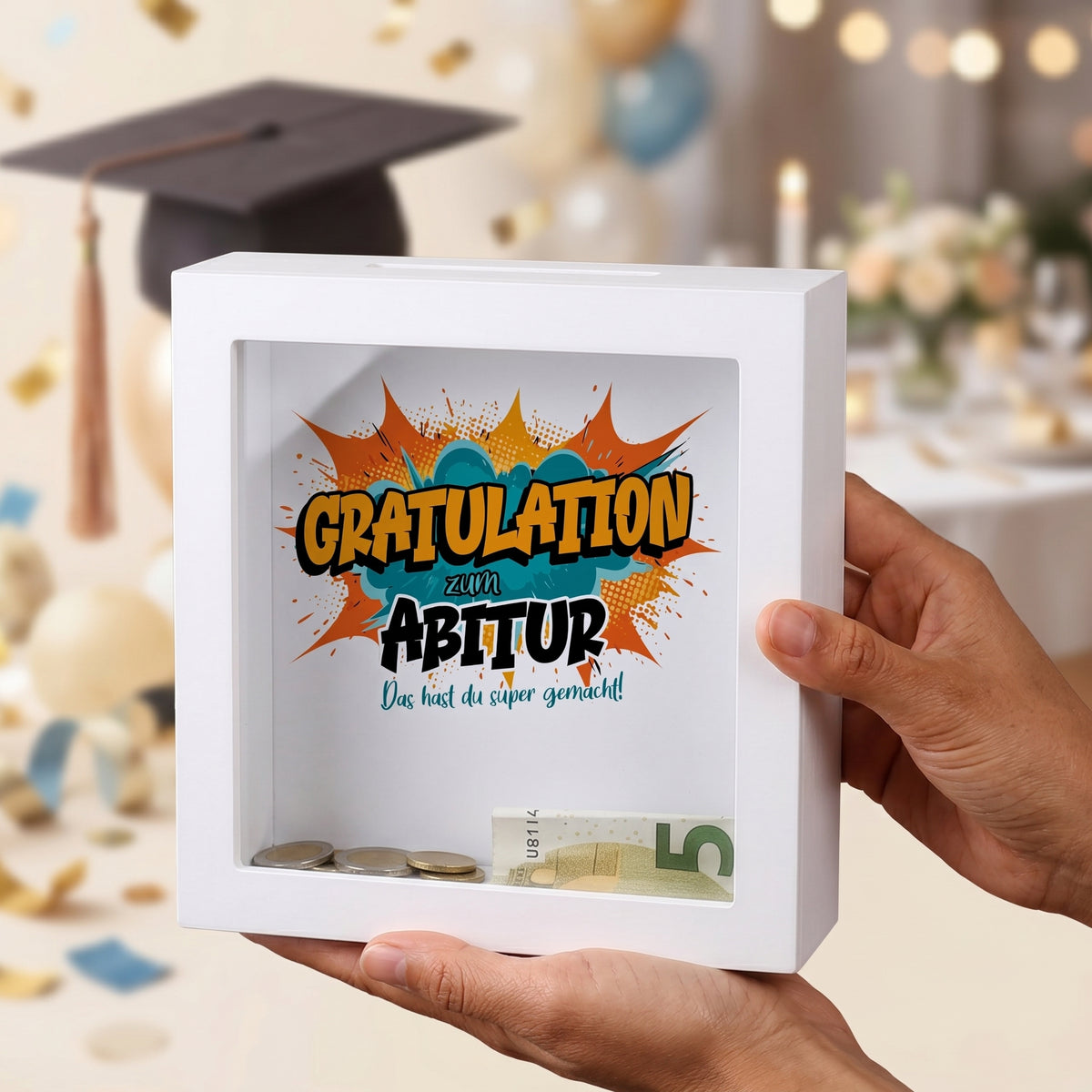 Weiße Bilderrahmen-Spardose als Geldgeschenk zum Abitur mit Comic-Motiv „Gratulation“