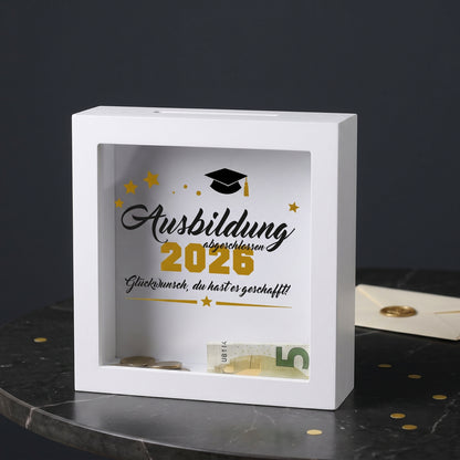 Bilderrahmen-Spardose „Ausbildung abgeschlossen 2026“ mit Geldschlitz und Geldschein als Geschenk zur bestandenen Ausbildung