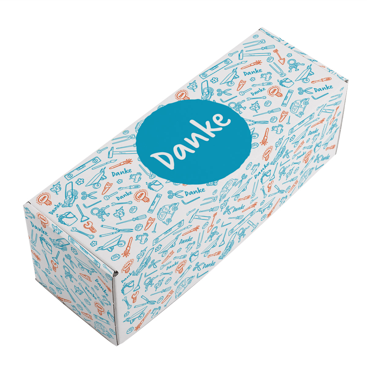 Detailansicht der Geschenkverpackung mit Werkzeug-Motiven und blauem Danke-Kreis auf neutralem Untergrund