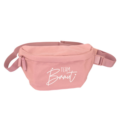 Rosa Bauchtasche mit weißem Team Braut Aufdruck als Produktbild auf weißem Hintergrund