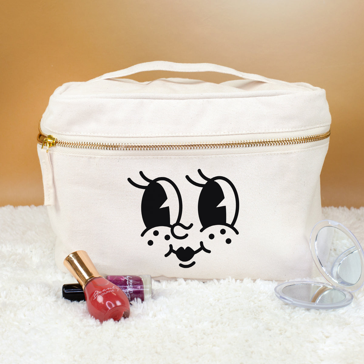 Kosmetiktasche mit großen Augen, Wimpern, Sommersprossen und Mund als Aufdruck