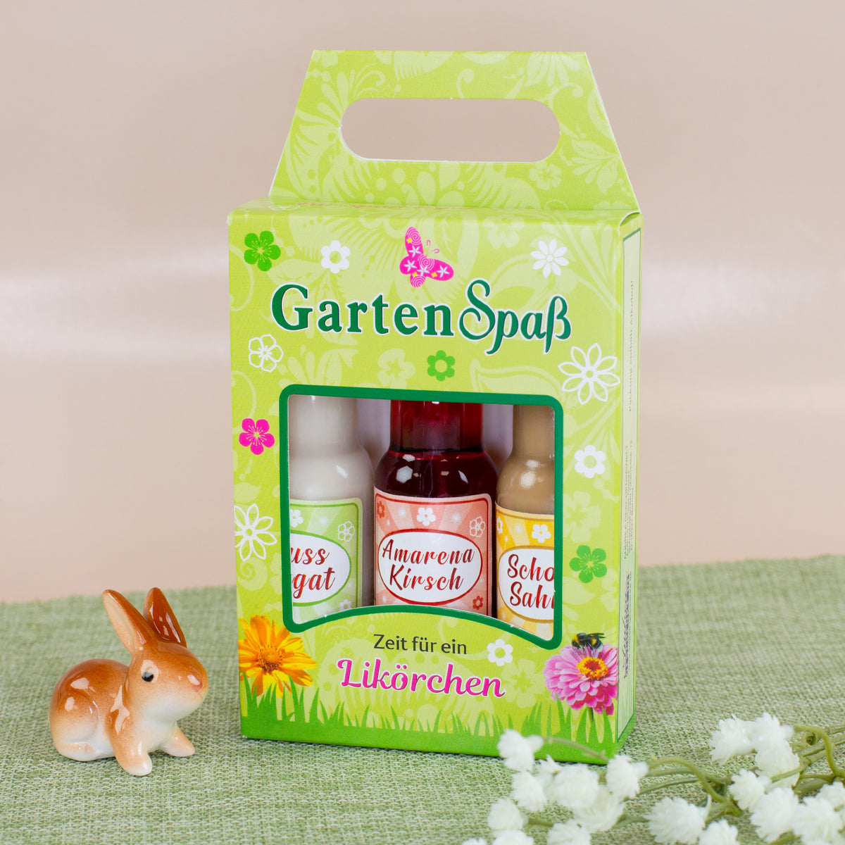 Geschenkset Likör „Gartenspaß“ dekoriert mit Osterhase und Frühlingsblumen