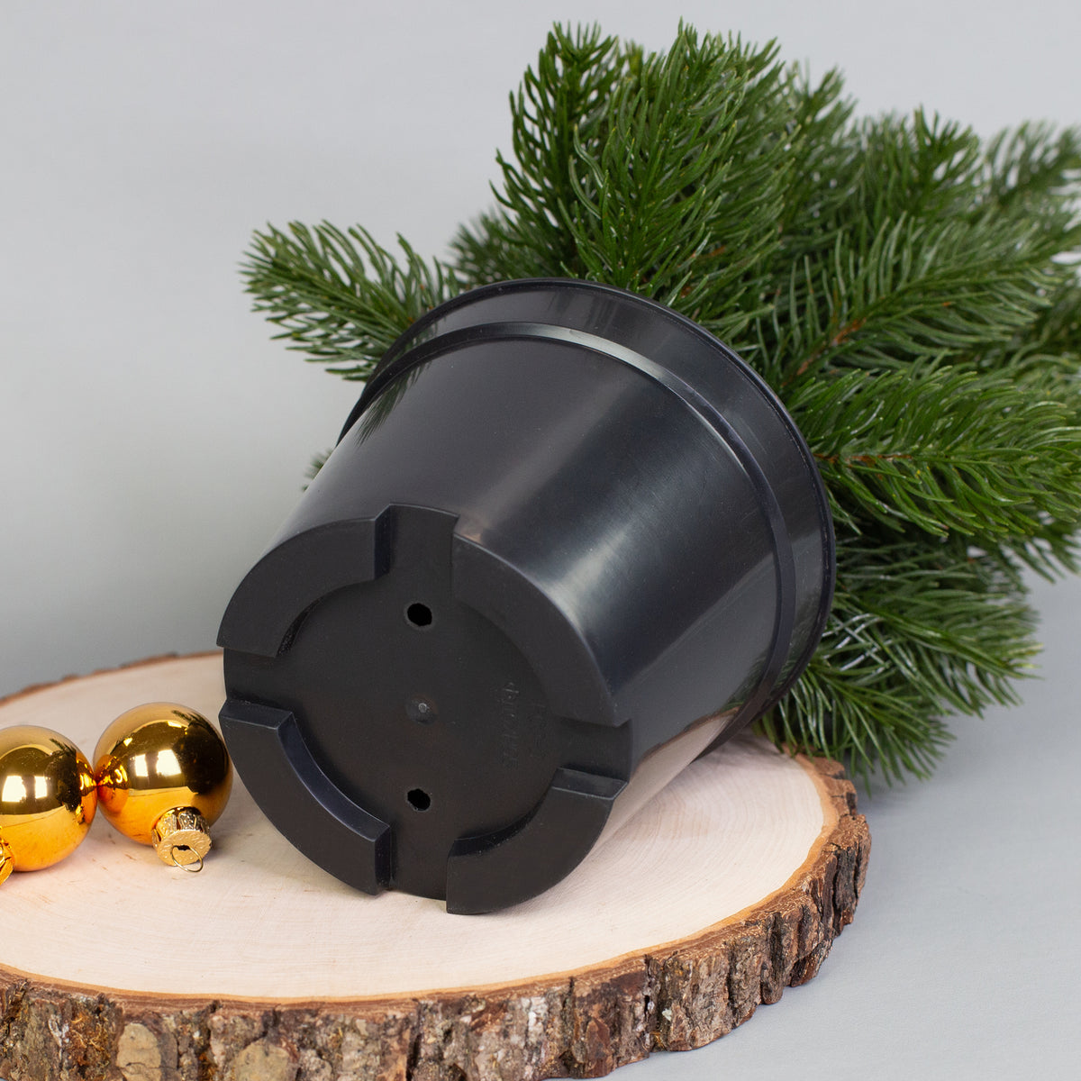 Kunststofftopf des künstlichen Weihnachtsbaums von unten mit stabilem Stand