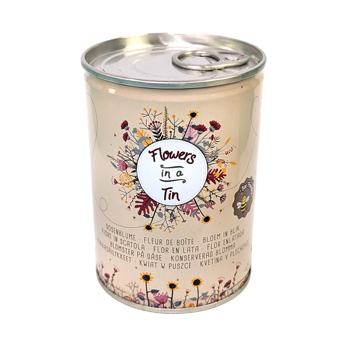 Dose mit Blumenwiese-Saatgut und Aufschrift „Flowers in a Tin“ auf weißen Hintergrund