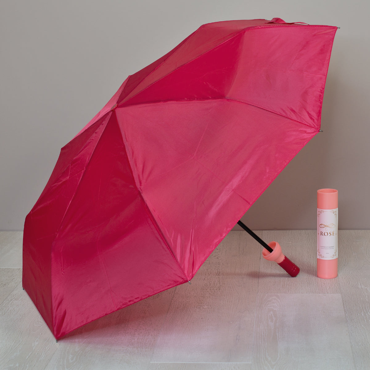 Taschen Regenschirm als Weinflasche Rosé