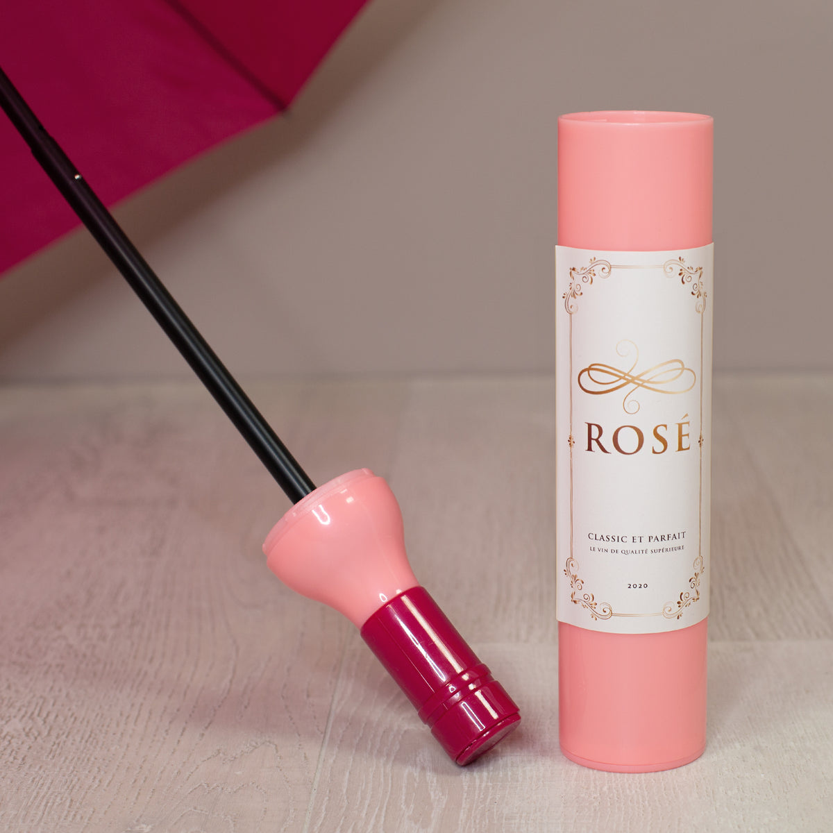 Taschen Regenschirm als Weinflasche Rosé