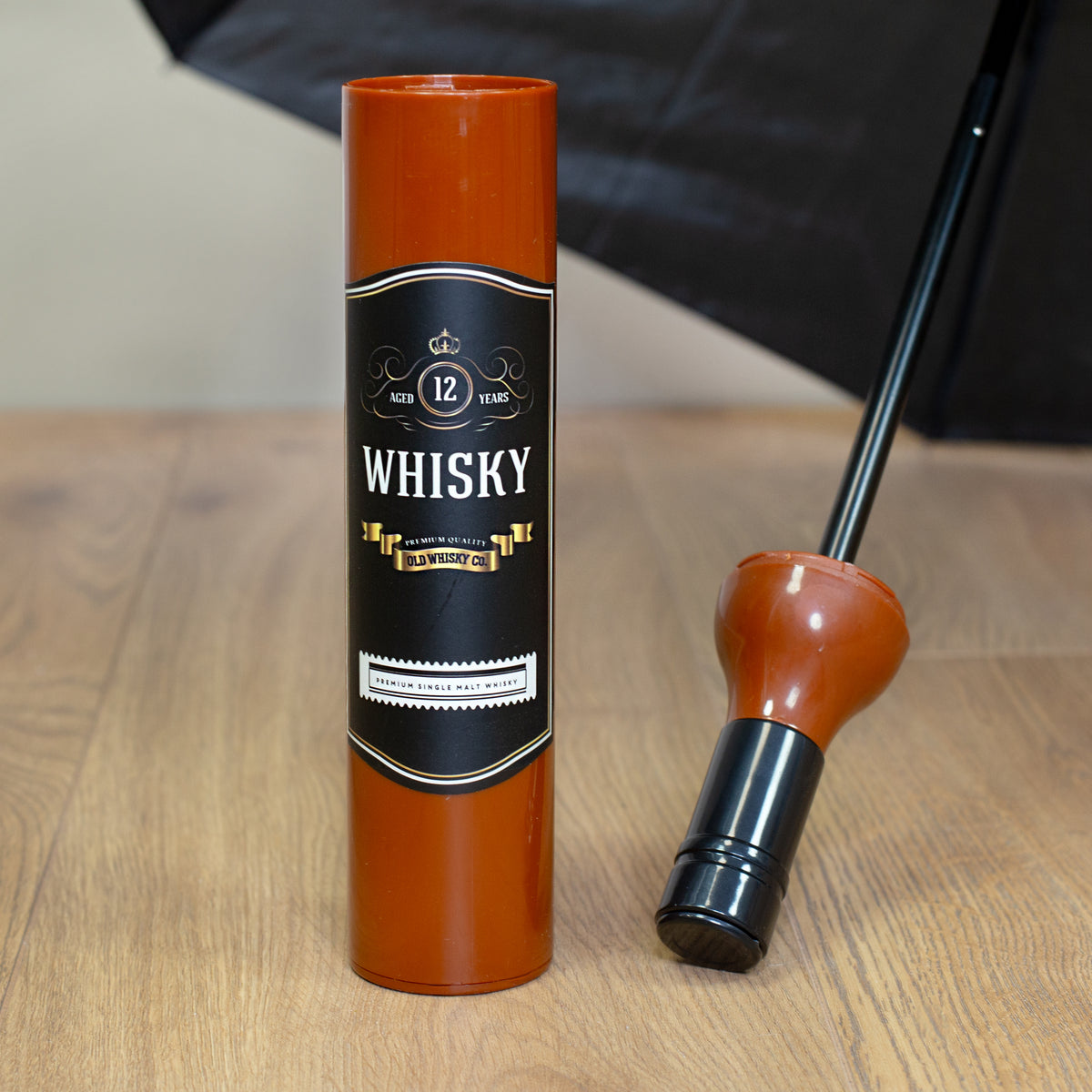 Taschen Regenschirm als Whiskyflasche