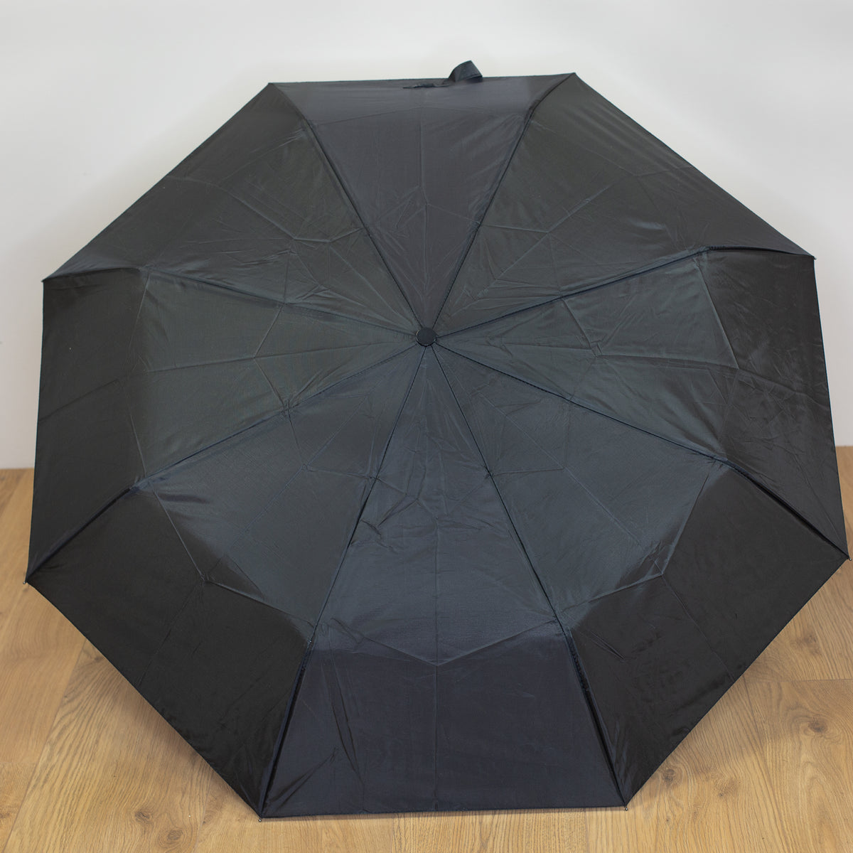 Taschen Regenschirm als Whiskyflasche