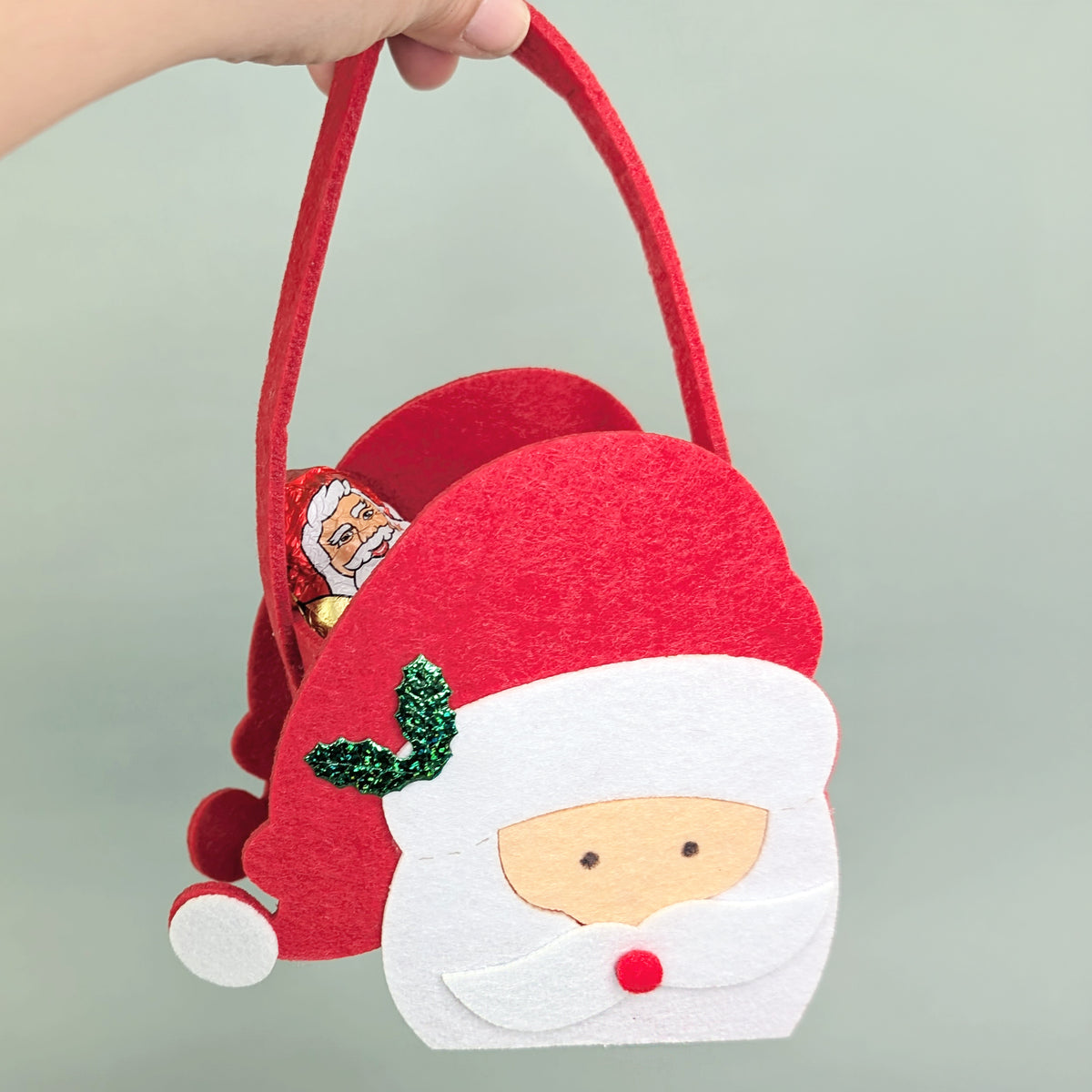 Geschenktüte aus Filz Weihnachten Motiv Weihnachtsmann-Gesicht