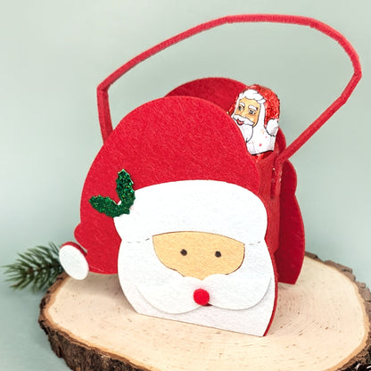 Geschenktüte aus Filz Weihnachten Motiv Weihnachtsmann-Gesicht auf Baumscheibe