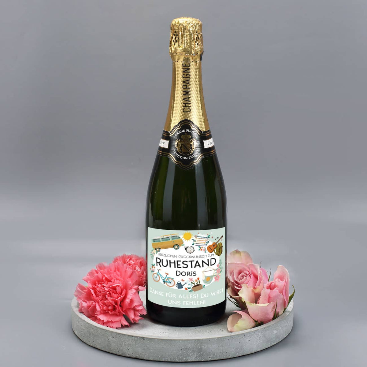 Champagnerflasche zur Rente mit Name und Wunschtext auf dem Etikett