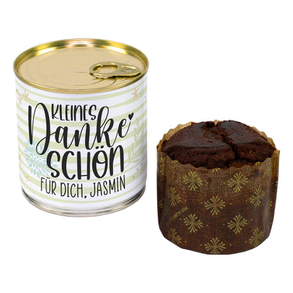 Schokoladen Brownie Kuchen in der Dose mit personalisiertem Danke Motiv neben ausgepacktem Brownie