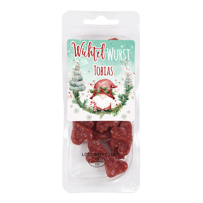 Einzelaufnahme des weihnachtlichen Wichtel-Wurst-Etiketts mit personalisiertem Namen.