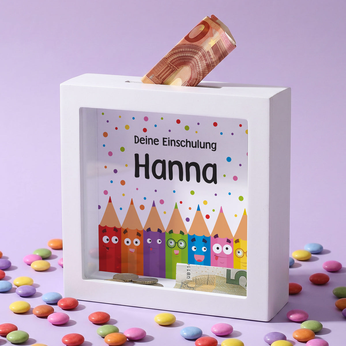 Personalisierte Spardose zur Einschulung mit Name Hanna, bunten Stiften und Geldschein