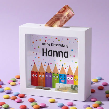 Personalisierte Spardose zur Einschulung mit Name Hanna, bunten Stiften und Geldschein