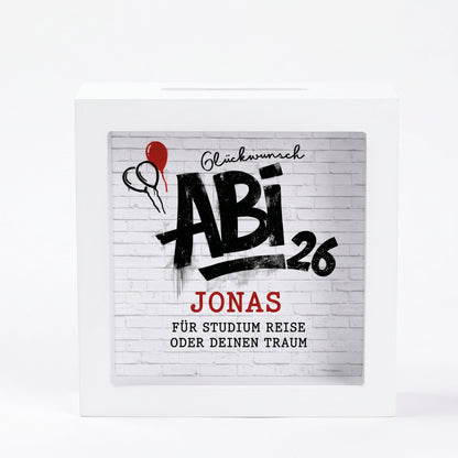 Frontansicht einer weißen Bilderrahmen Spardose mit Abi 26 Motiv und Name Jonas vor weißem Hintergrund