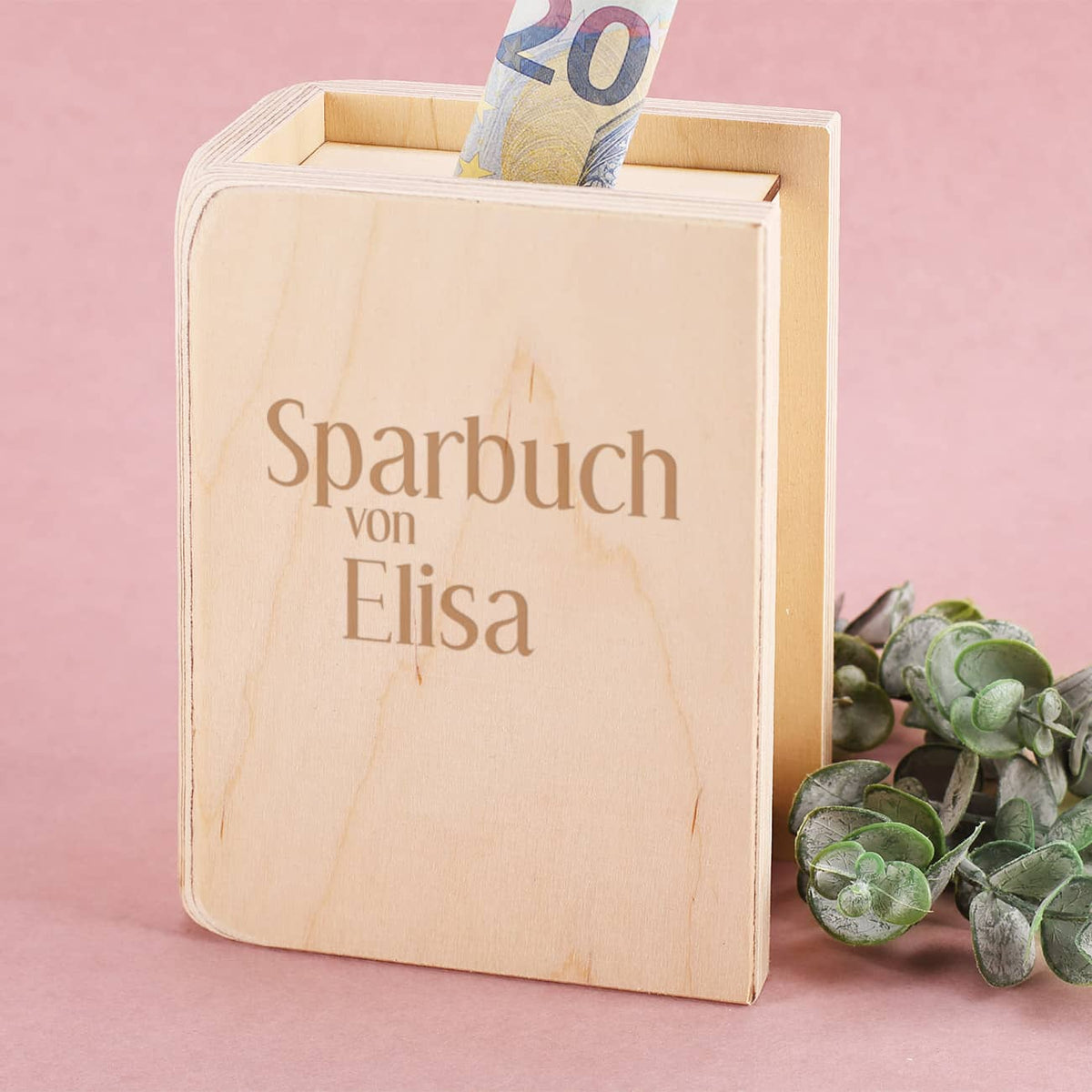 Spardose in Buchform mit Einwurfschlitz