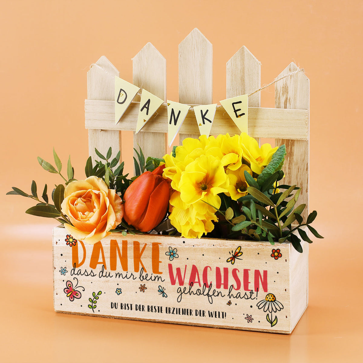 DIY-Pflanzkiste mit farbigem Druck und dem Text „Du bist der beste Erzieher der Welt!“ – ideal als Abschiedsgeschenk