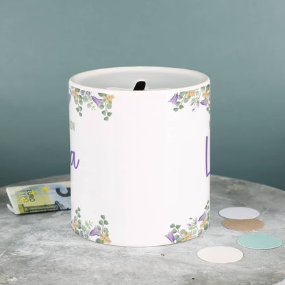 Spardose mit lila Blumenmotiv