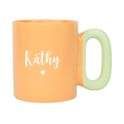 Orange Tasse mit Name Pauli und Herzmotiv freigestellt