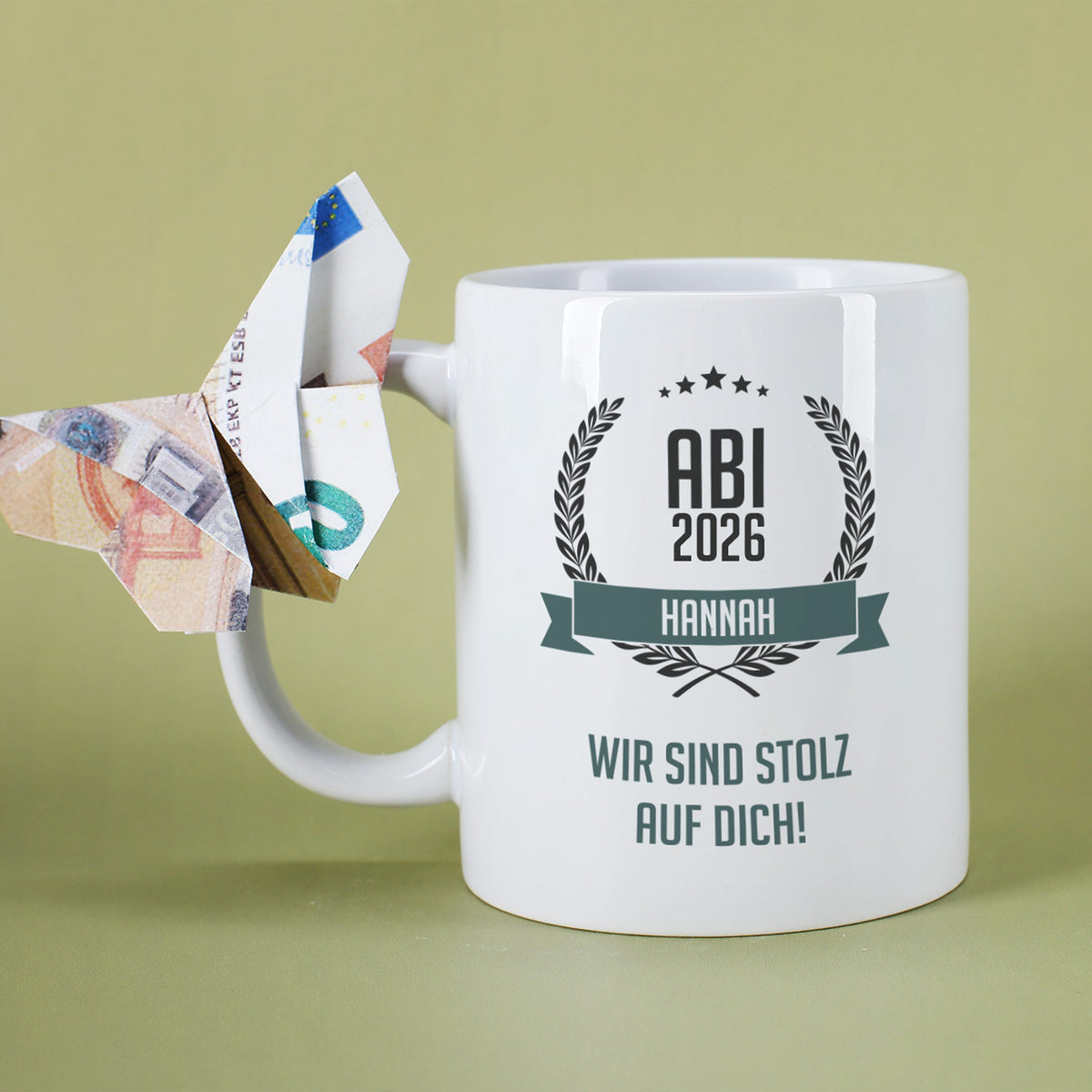 Glückwunsch-Tasse zum Abitur mit Name und Wunschtext als Geldgeschenk mit Geldschein