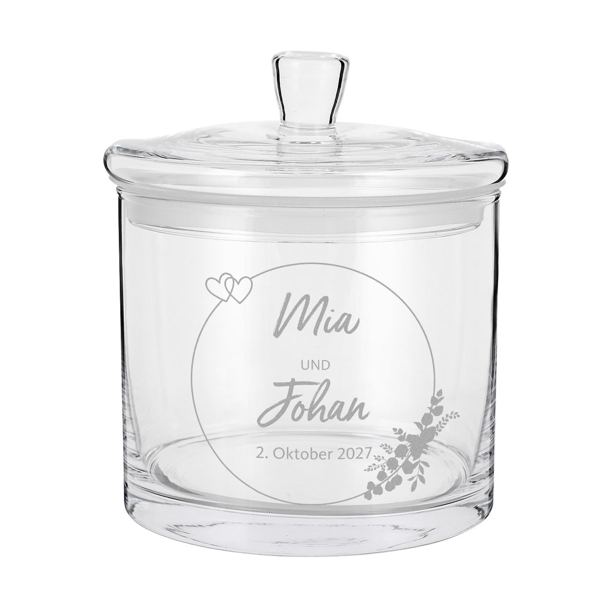 Leere Glasdose mit Gravur von Mia und Johan als personalisiertes Hochzeitsgeschenk