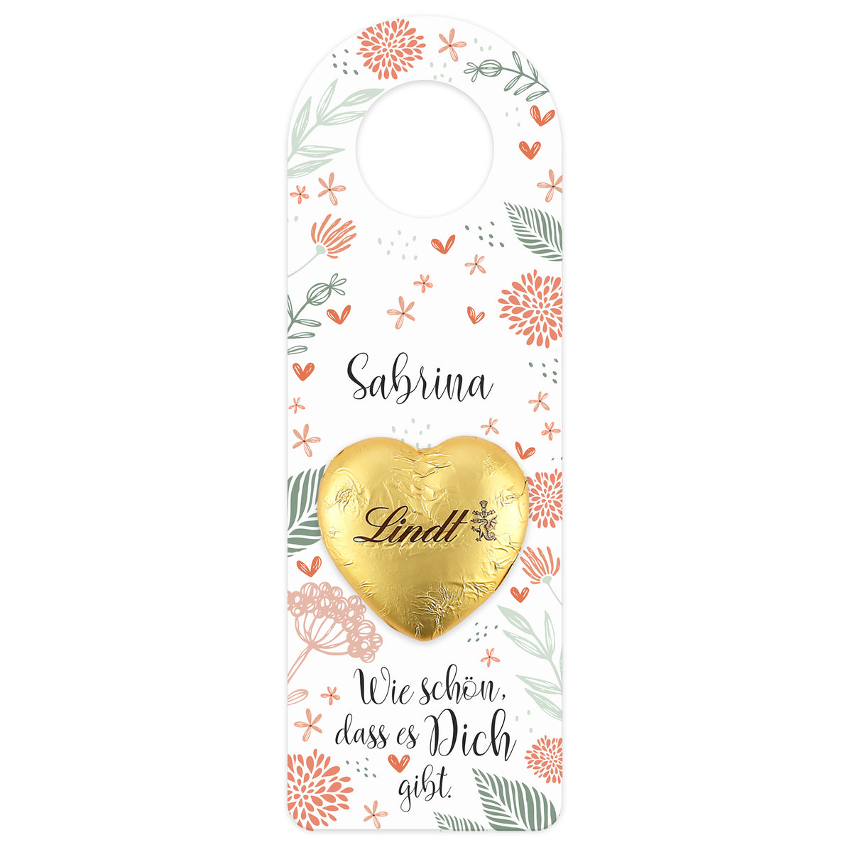 Großer Flaschenanhänger mit floraler Gestaltung und Lindt Schokoladenherz – freigestellt auf weißem Hintergrund.