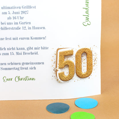 Detailaufnahme der goldenen Zahl 50 auf der Einladungskarte