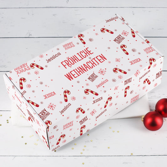 Weihnachtsgeschenkverpackung mit Zuckerstangen und Wunschtext