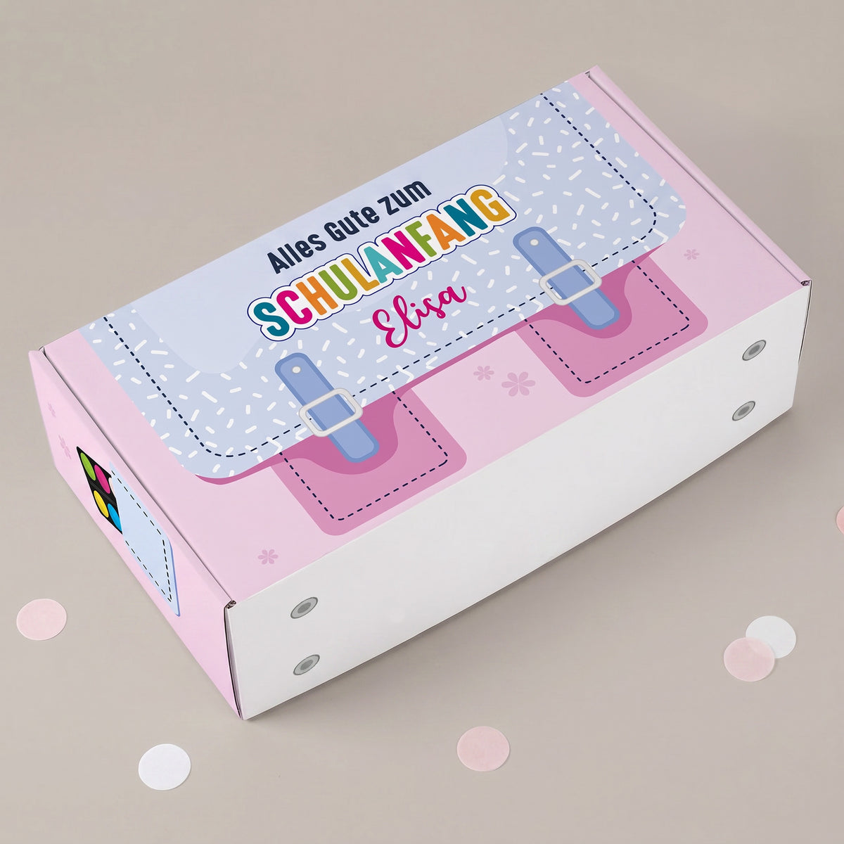 Mittlere rosa Geschenkbox zur Einschulung mit Name und Schulranzen-Motiv bedruckt