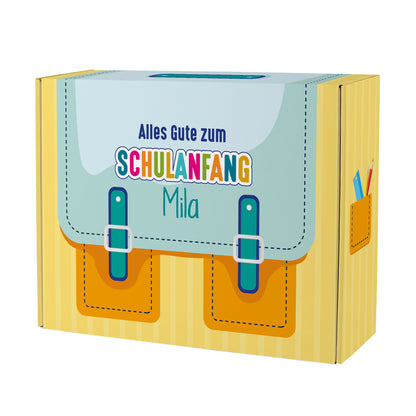 Große gelbe Geschenkverpackung zur Einschulung im Schulranzen-Design mit Name personalisiert