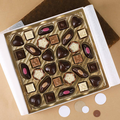 Schachtelinhalt: 32 kleine Lindt Pralinen ohne Alkohol