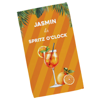 Mittleres Handtuch mit Aperol-Motiv und personalisiertem Text, einseitig bedruckt, auf weißem Hintergrund.