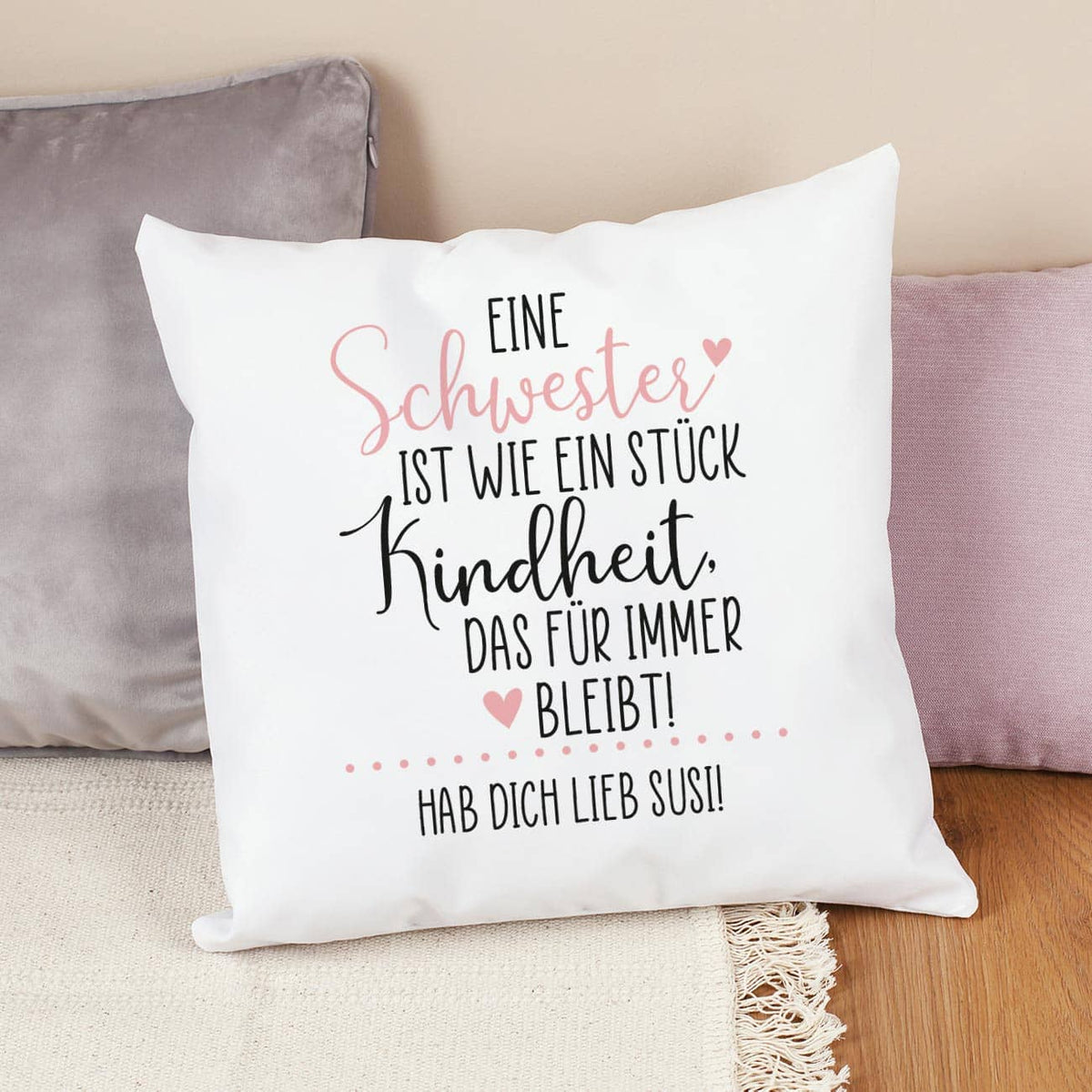 Mit liebevollem Spruch bedrucktes Zierkissen