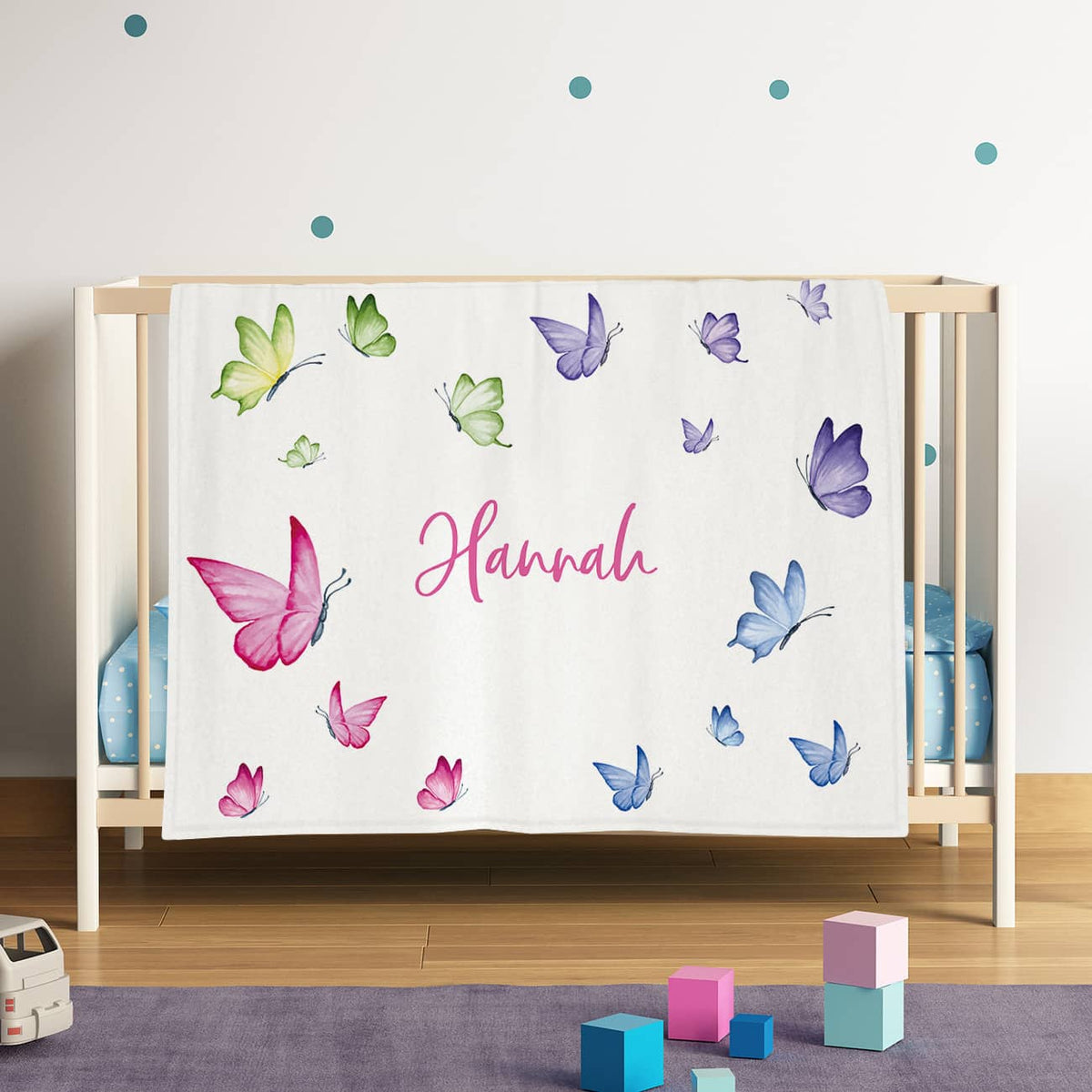 Babydecke mit Schmetterling Motiv in Pastelltönen und Name nach Wunsch als Druck