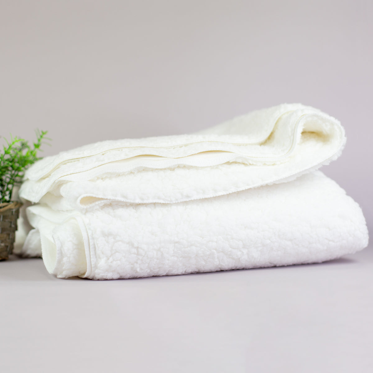 Detailaufnahme der flauschigen Sherpa-Innenseite, weich und wärmend