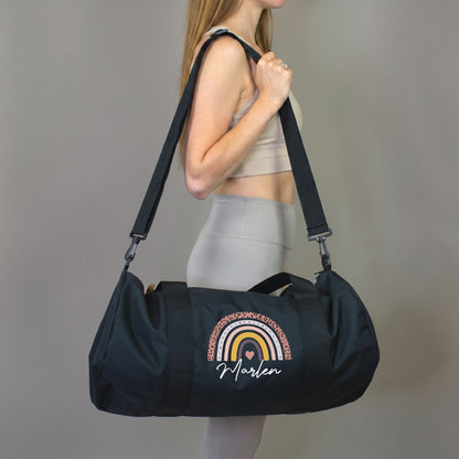 Schwarze Sporttasche mit Regenbogen Motiv und Name Marlen als Trainingstasche für Mädchen und Frauen