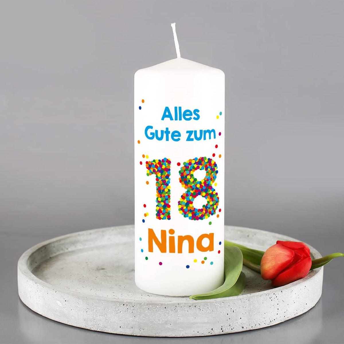 Kerze zum 18. Geburtstag mit Name und Wunschtext