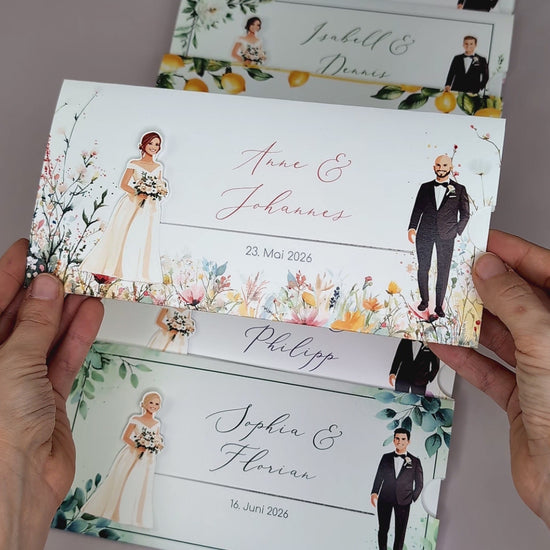 Hochzeitseinladung – Ziehkarte mit Brautpaar und Wiesenblumen-Motiv