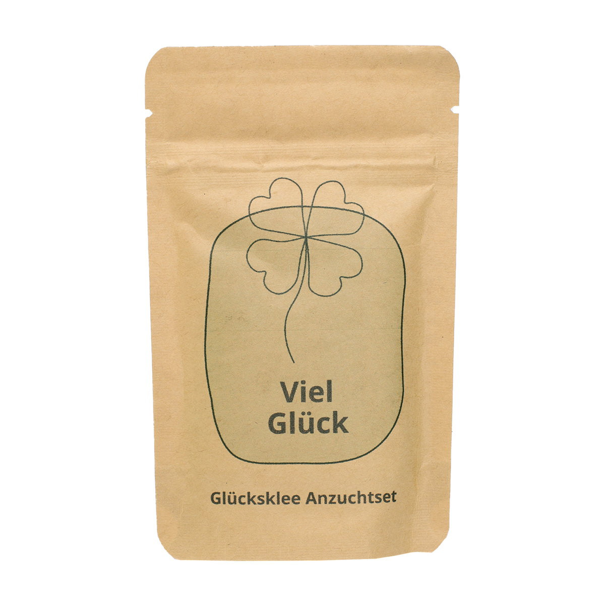 Freigestelltes Viel Glück Anzuchtset in Kraftpapiertüte mit Kleeblatt-Motiv